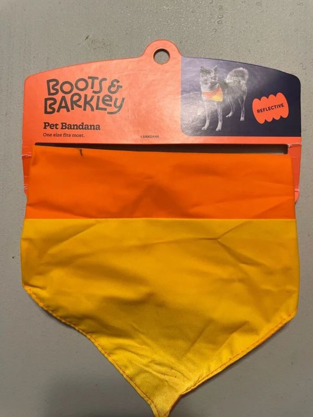 Boots & Barkley brand pet bandana featuring reflective design candy corn costume